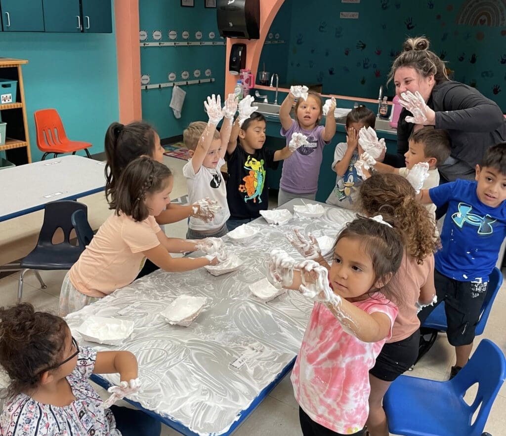 experimentwithadult Kids playing with flour