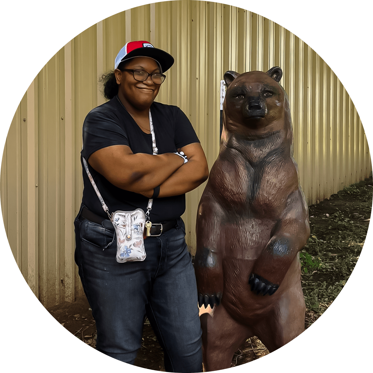 Individual posing with a bear